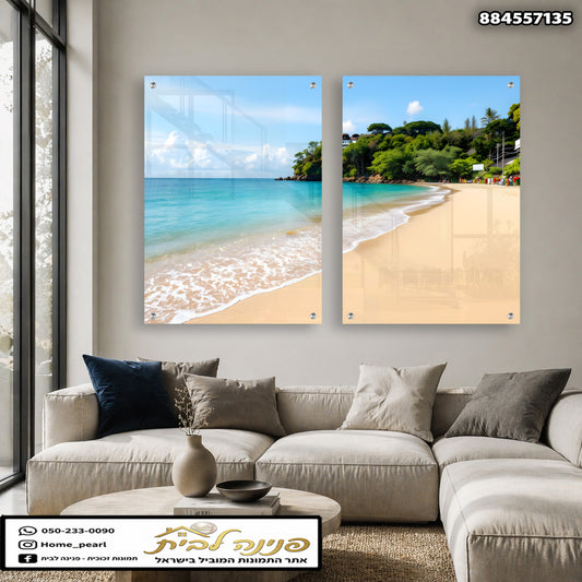 Set of two glass wall art panels featuring a tropical beach with turquoise water, soft sand, and lush green trees