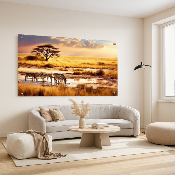 תמונות לבית - זברות שותות מים בנוף סוואנה זהוב באור שקיעה