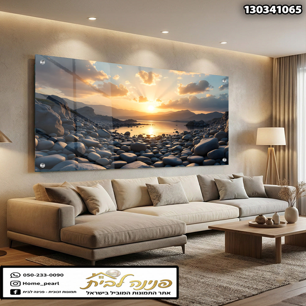 תמונה של שקיעה מעל לחוף עם אבנים - תמונות לבית - צבעים של בז' ואדום