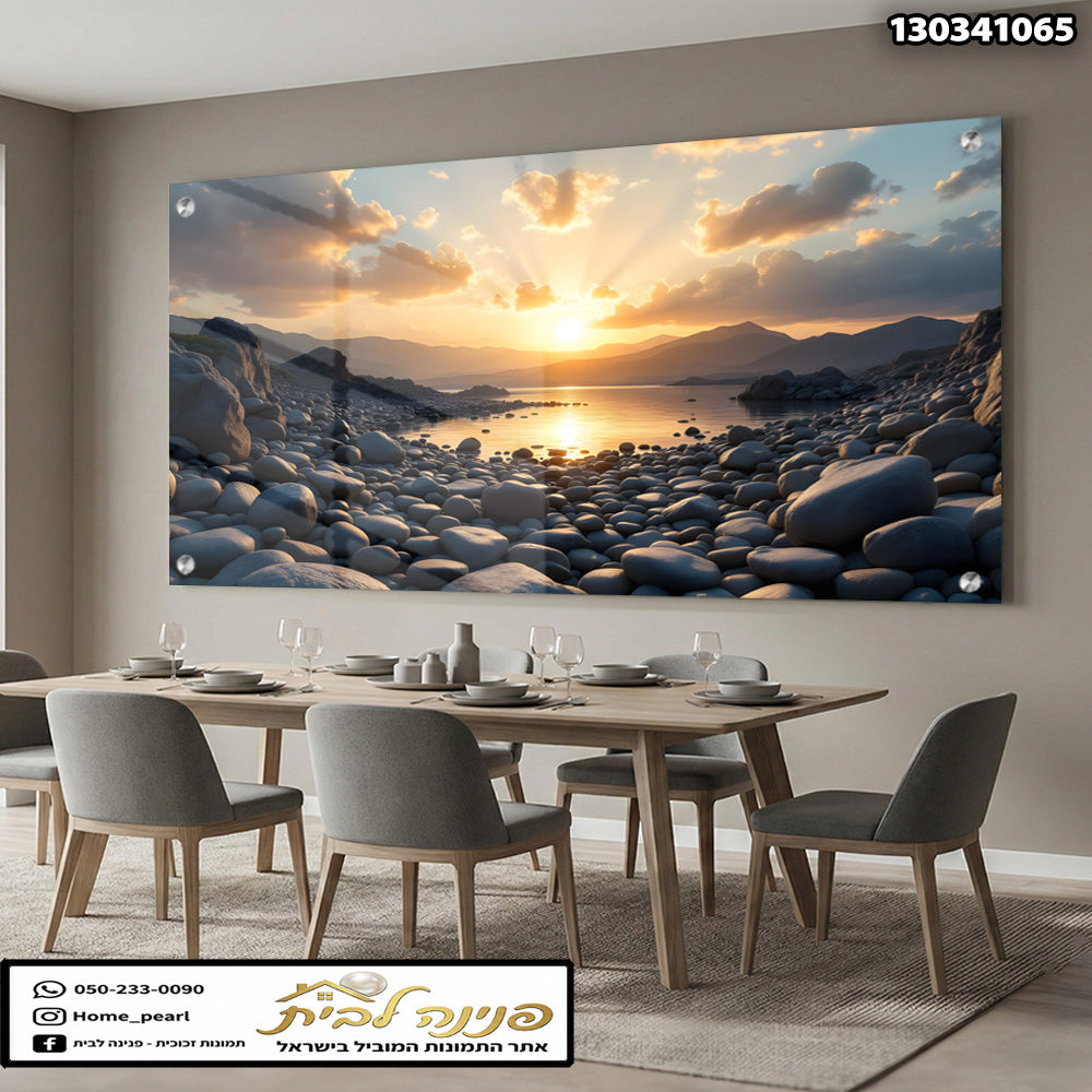 תמונה של שקיעה על חוף עם אבנים - תמונות קיר - צבעים חמים