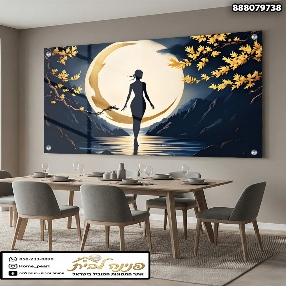 תמונה של אישה עומדת ליד המים מוארת באור ירח - תמונות לבית - צבעים כחול וזהב
