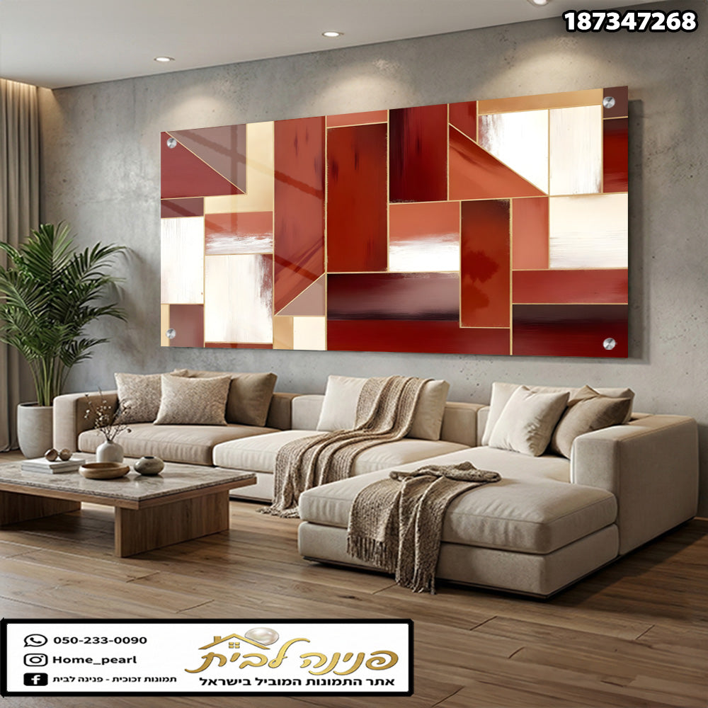 תמונה של קיר עם תמונת נוי בגווני אדום וחום