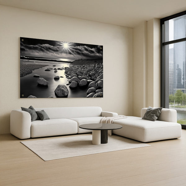 תמונת זכוכית שחור לבן עם נהר ואבנים